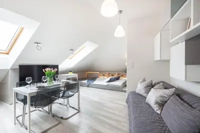 a living room with a glass table and a couch at MODERN & NEW place next to Wawel Castle & Vistula in Kraków