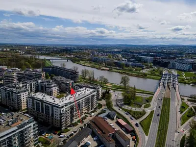 an aerial view of a city with a river and buildings at Glossy Apart G29 in Kraków