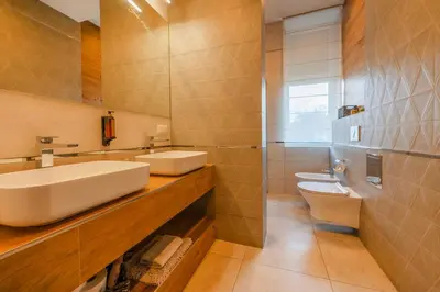 a bathroom with a sink and a toilet at Florencja Moxy TE&AM Stare Miasto Dworzec 3 min Parking GRATIS in Kraków