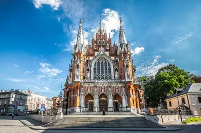 a large cathedral with steps in front of it at Premium Loft Apartments-City Center Parking by Urban Escape in Kraków
