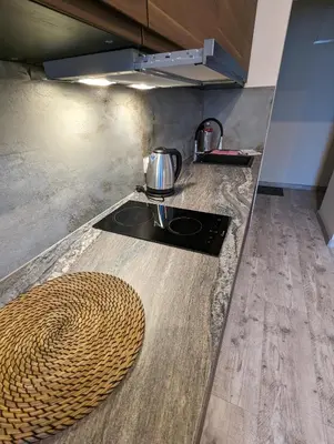 a kitchen with a sink and a counter top at Apartment A3 in downtown of Krakow in Kraków