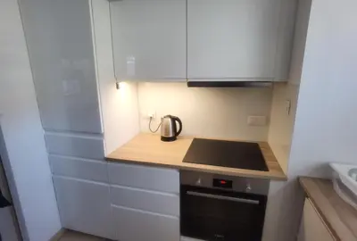 a kitchen with a tea kettle on a counter at Novum apartment in the city center in Kraków