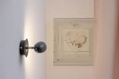 a picture of a heart with a flower on a door at Cosy Ariańska Apartment for 2 in Cracow Center by Noclegi Renters in Kraków