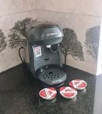 a blender sitting on a counter next to some plates at OMORIKA na Zamkowej in Kraków