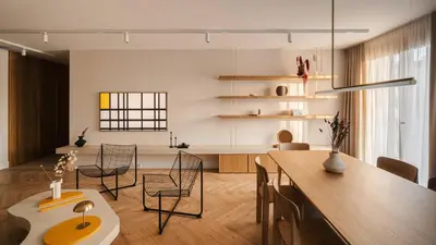 a kitchen and dining room with a table and chairs at Kossak Residence, Sun & Snow in Kraków