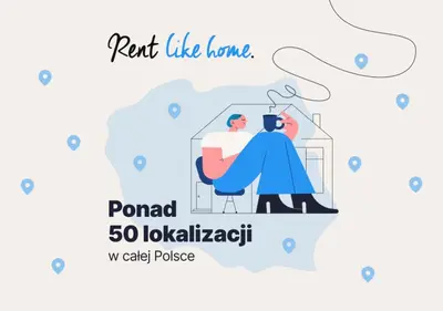 a man sitting in a chair with a cup of coffee and translated translated translated translated at Comfortable Apartment with Balcony in Krakow by Rent like home in Kraków