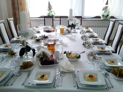 a long table with plates of food on it at Zajazd Kwadrat in Dąbrowa Górnicza