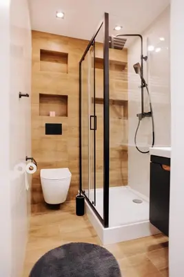 a bathroom with a shower and a toilet and a sink at Best of Azory apartment in Kraków