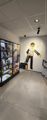 a room with a lego man on a treadmill at A charming loft in the heart of KRAKÓW with free parking in Kraków