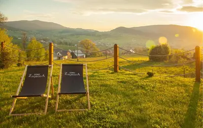 a pair of chalkboards sitting on top of a field at Awesome Home In Slopnice With Sauna in Słopnice