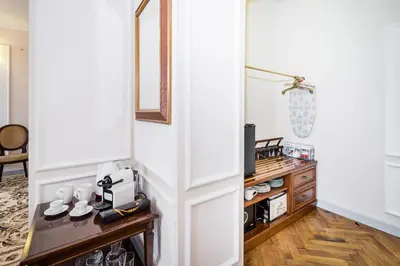 a hallway with a door leading into a room with a kitchen at Househost Apt: Starowiślna 75/3/1 in Kraków