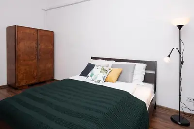 a living room with a couch and a table at Dietla 57, two-bedroom apartment with living room, apartment 24 , Ulysses in Kraków