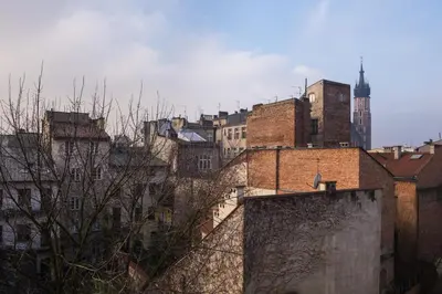 a group of buildings in a city with at Tomasza 26 Old Town Suites in Kraków