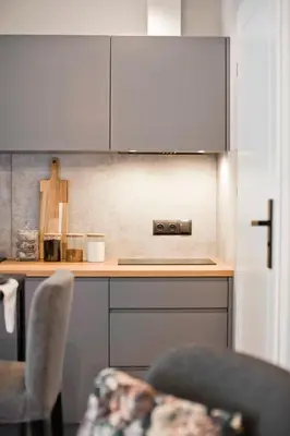 a kitchen with a counter and a counter top at Balaton Apartamenty in Trzebinia
