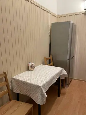 a kitchen sink with plates and utensils on a shelf at OLD KRAKOV in Kraków