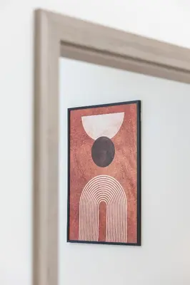 a framed painting of a rainbow and the moon at Luxury Apartment near the City Center of Cracow by Renters Prestige in Kraków