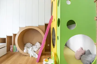 a childs play room with a play house at Miejska Cisza Urban Silence in Kraków