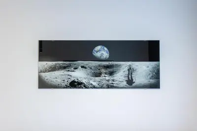 an image of the moon with the earth on the horizon at DS Apartamenty Jaśminowa in Zator