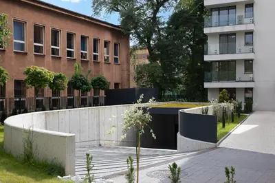 a courtyard in front of a building at Metropolis Old Town Apartments in Kraków