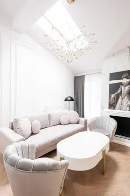 a living room with a couch and a table at Native Apartments Starowiślna 43/15 in Kraków