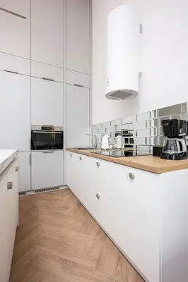 a living room with a couch and a table at Native Apartments Starowiślna 43/16 in Kraków