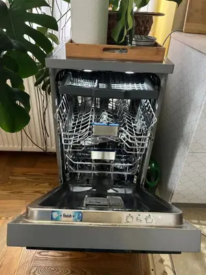 a dishwasher with a rack of dishes in it at Greenthumb Praska in Kraków