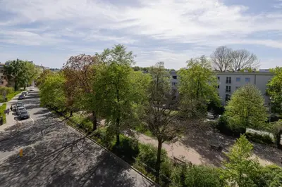 an overhead view of a street with trees and buildings at 3 bedroom apartment-Aleja Daszyńskiego- Grzegórzki in Kraków