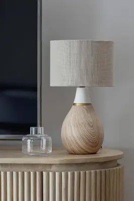 a lamp sitting on top of a table at Luxury Studio - Lwowska 10 street in Kraków