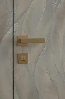 a wall with two switches on a wall at Luxury Studio - Lwowska 10 street in Kraków