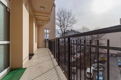 a balcony with a view of a city at Charming Studio - 54 Starowislna street in Kraków