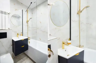 a bathroom with two sinks and a shower at Dwupokojowy Apartament 700 m od Szpital Prokocim in Kraków