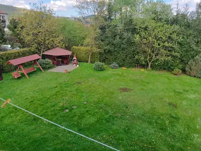 an aerial view of a yard with a picnic table at Apartament u Moni in Sucha Beskidzka