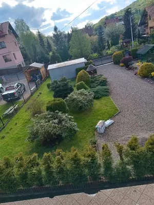 an aerial view of a garden with bushes and trees at Apartament u Moni in Sucha Beskidzka