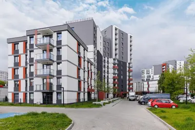 a rendering of a large apartment building on a street at Modern Apartment with Parking near Tauron Arena by Rent like home in Kraków