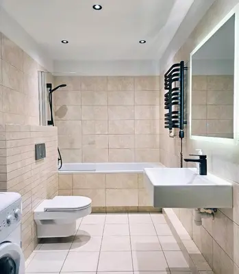 a bathroom with a toilet and a sink at Old Town Plaza Apartment in Kraków