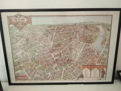 a framed map of london on a wall at Apartament Central Station Batorego in Kraków