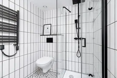 a white bathroom with a toilet and a shower at Main Station - Radziwiłłowska 27 in Kraków