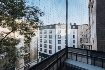 a view of a building from a balcony at Studio with balcony - Rzeszowska 4 Street in Kraków