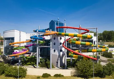a water park with a colorful water slide at Premium Vintage Apartament by Krakow Home in Kraków