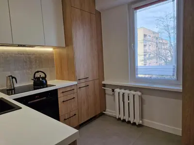 a kitchen with a sink and a window at Moje miejsce Zator in Zator