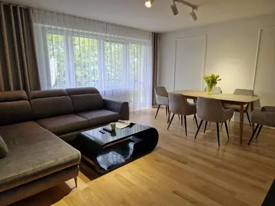 a living room with a couch and a table at Moje miejsce Zator in Zator
