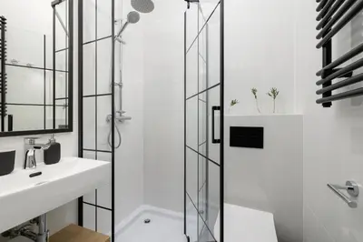 a bathroom with a shower and a sink at Kazimierz - Balcony Apartment- Starowiślna 41 in Kraków