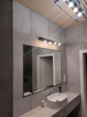 a bathroom with a sink and a mirror at Apartament z dużym tarasem, bezpłatny parking, AWG APARTMENTS in Kraków