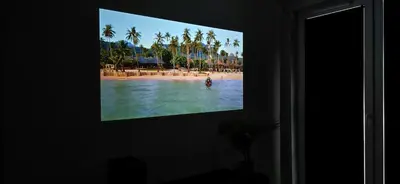 a tv screen with a picture of a person in the water at Movie Nights Tauron Arena in Kraków