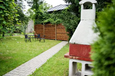 a tea kettle is sitting on a counter at Magic Apartments - Garden in Zator