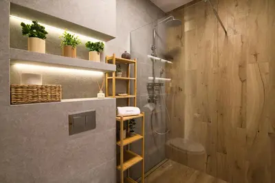 a bathroom with a shower and a toilet and some plants at Jaśminowa Ostoja Zator by Housine in Zator