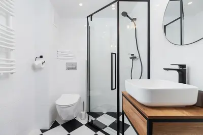 a bathroom with a sink and a shower at Kazimierz District - 43 Starowislna Street in Kraków