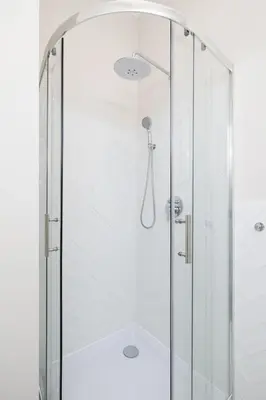 a shower with a glass enclosure in a bathroom at Studio for two - Kazimierz District - Starowiślna 43 in Kraków