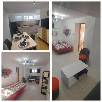 a large white house with a driveway at Apartament u Majki in Bystra