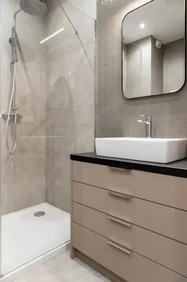 a bathroom with a shower and a sink and a mirror at Househost Apartment Smoleńsk 33-309A in Kraków